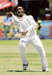 West Indies� Fidel Edwards rejoices after getting rid of South Africa�s Graeme Smith