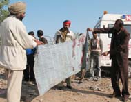 The police staff investigating at the spot of murder in Bathinda on Sunday.