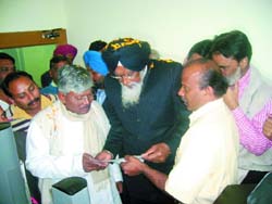 West Bengal minister Narayan Biswas and MP Zora Singh Mann at the inauguration of Tacospin Cotton Research and Testing Centre in Abohar on Tuesday.