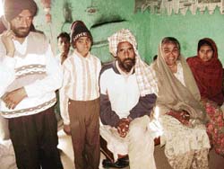 Parents and wife of alleged human bomb Palwinder Singh at Kamalpura village.