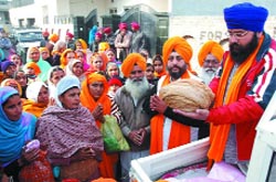 The turban of Guru Gobind Singh being displayed at a Nagar Kirtan in Bathinda on Wednesday.
