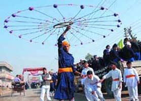 A boy performing the traditional martial art �Gatka� on Friday.