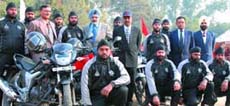 Members of the Parbat Ali and Hero Honda Joint Motorcycle Expedition team with Lt Gen R.S. Sujlana and other Army officials after returning to the Bathinda Military Station on Sunday.
