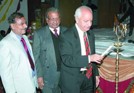 Chief guest M.L.Aeri lighting a lamp to inaugurate the National Conference on Recent Advancement and Developments in Chemical Sciences in Abohar on Monday.