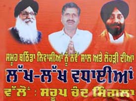 Hoardings greeting people on the occasion of New Year and Lohri put up in 2008.