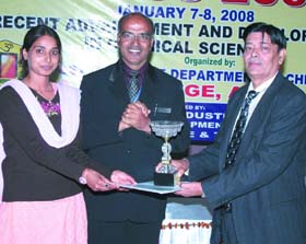 One of the winners receiving award on the concluding day of the National Conference on Recent Advancement and Developments in Chemical Sciences in Abohar on Tuesday.
