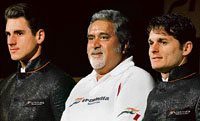 Force India drivers Giancarlo Fisichella (L) and Adrian Sutil (R) with team co-owner Vijay Mallya in Mumbai on Thursday.