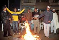 Residents of Tagore Colony celebrating Lohri in Bathinda on Sunday