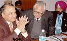 Governor of Punjab S.F. Rodrigues (left) along with the vice-chairman of the Centre for Research in Rural and Industrial Development, Prof R. P. Bambah (centre), at a seminar in Chandigarh on Monday. 