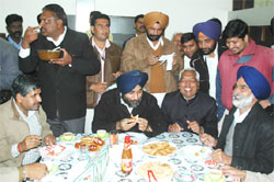 Only sweets, no spices: Three arch rivals, Sarup Chand Singla, Chiranji Lal Garg and S.S. Maluka, share the breakfast table as Sukhbir Badal plays the peace-maker