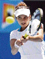 Sania Mirza hits a return to Timea Bacsinszky in the second round of the Australian Open in Melbourne