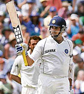 VVS Laxman acknowledges the crowd on completing his fifty on the third day of the Perth Test.