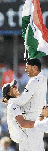 Ishant Sharma (L) and 12th man Harbhajan Singh are cock-a-hoop.