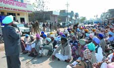 Congress MLA Ajaib Singh Batthi speaking to the villagers at Bhatti road in Bathinda on Sunday. 