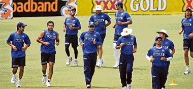 India's cricketers warm up during a training session at Adelaide Oval stadium in Adelaide on Wednesday.