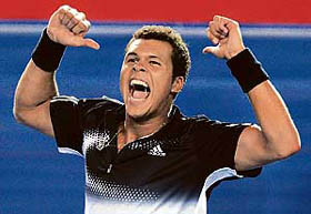 Jo-Wilfried Tsonga exults after beating Rafael Nadal in the semifinal of the Australian Open on Thursday.