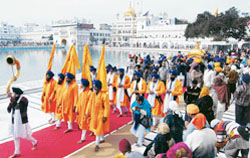 A procession being taken out to mark the birth anniversary of Shaheed Baba Deep Singh in the Golden Temple in Amritsar on Friday. � AFP