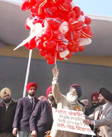 CM Parkash Singh Badal releases balloons to mark inauguration of the Punjab State Panchayat Tournament in Bathinda on Sunday. 
