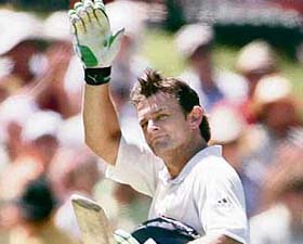 Adam Gilchrist waves as he leaves the pitch after batting for possibly the last time in Test cricket