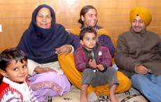 Gappu back in the lap of his mother after he was released by kidnappers at Bathinda on Monday.