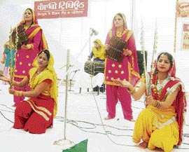 Students of Swami Ganga Giri College for Women, Raikot, perform during a cultural programme on Tuesday.