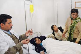 Two of the passengers injured in the road mishap, undergoing treatment at a private hospital in Bathinda