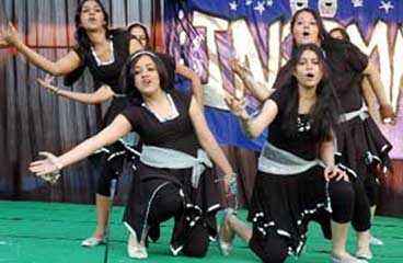 Students of Adesh Institute of Medical Sciences and Research participating in a dance event at the annual function of the institute on Friday. 