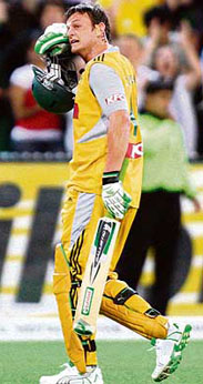 Australian batsman Adam Gilchrist wipes the sweat from his brow after being dismissed as Australia defeated India in their Twenty20 match at the MCG in Melbourne. 