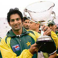 Pakistan�s Shoaib Malik holds the Mobilink trophy after his team beat Zimbabwe in the fifth one-dayer in Sheikhupura on Saturday. Pakistan swept the series 5-0.