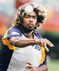 Sri Lankan paceman Lasith Malinga fires a return during training session