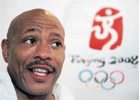 Maurice Greene, former world and Olympic champion in the 100m and 200m sprints, during a news conference in Beijing on Monday. 