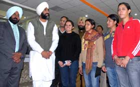 Punjab finance minister Manpreet Singh Badal flanked by Sports Director Pargat Singh (to his right) and the international shooters from Punjab at the 1st All India Women Air Weapons Championship on Tuesday. The event is being held at Badal village in Muktsar district.