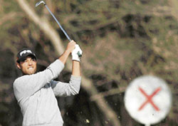 Arjun Atwal drives during the third round of the Emaar-MGF Indian Masters in New Delhi