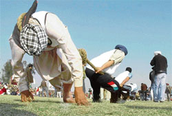 A tug-of-war competition in progress during the annual sports festival at Kila Raipur