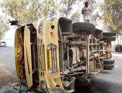 The ill-fated mini-bus which overturned on the Amritsar-Jalandhar road