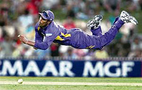 Chamara Kapugedera of Sri Lanka gives his all trying to catch a ball hit by India�s Rohit Sharma during their one-dayer in Adelaide on Tuesday.