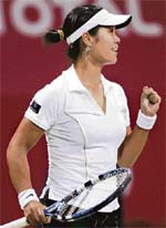China's Li Na celebrates after beating Jelena Jankovic of Serbia in the quarterfinals of the Qatar Open in Doha on Friday. Na won 6-3, 6-4.