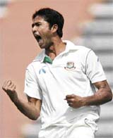 Shahadat Hossain of Bangladesh celebrates the dismissal of a South African batsman
