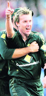Brett Lee, left, is embraced by teammate Matthew Hayden after dismissing Sachin Tendulkar during the Sydney ODI against India.