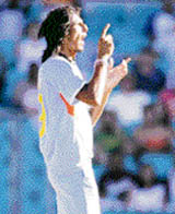Ishant Sharma celebrates bowling out Andrew Symonds (not shown) during their tri-series one-day match at Sydney Cricket Ground
