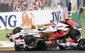 Italy's Giancarlo Fisichella takes off in his Force India car after being hit from behind at the start of the Australian Formula One Grand Prix in Melbourne on Sunday