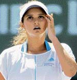 Sania Mirza reacts after losing a point during her fourth-round match against Slovakia's Daniela Hantuchova at the Pacific Life Open in Indian Wells, California, on Tuesday. 