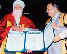 Gen S.F. Rodrigues (retd), Governor of Punjab, confers honorary DLit on Punjabi novelist Jaswant Singh Kanwal at the annual convocation of Guru Nanak Dev University on Thursday.
