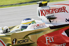 Giancarlo Fisichella negotiates a turn in his Force India F1 car during the first free practice session at the Sepang International Racing Circuit in Sepang on Friday.