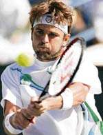 USA's Mardy Fish returns a shot to Roger Federer of Switzerland in their semifinal match at the Pacific Life Open in Indian Wells, California on Saturday. 