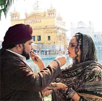 Rishi Kapoor and Rekha shoot for the Hindi feature film, �Sadiyaan,� at the Golden Temple in Amritsar on Tuesday. 