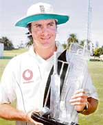 England captain Michael Vaughan holds the trophy after his team won the Test series against New Zealand in Napier on Wednesday