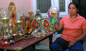 Sunita Rani displays the laurels she brought to the nation. 