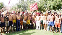 Activists of the Lal Jhanda Punjab Bhatha Mazdoor Union protest against the non-revision of minimum wages of workers at the district administrative complex in Sangrur