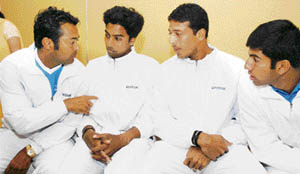 (L-R) Leander Paes, Prakash Amritraj, Mahesh Bhupathi and Rohan Bopanna wait for the match draw in New Delhi on Thursday. 